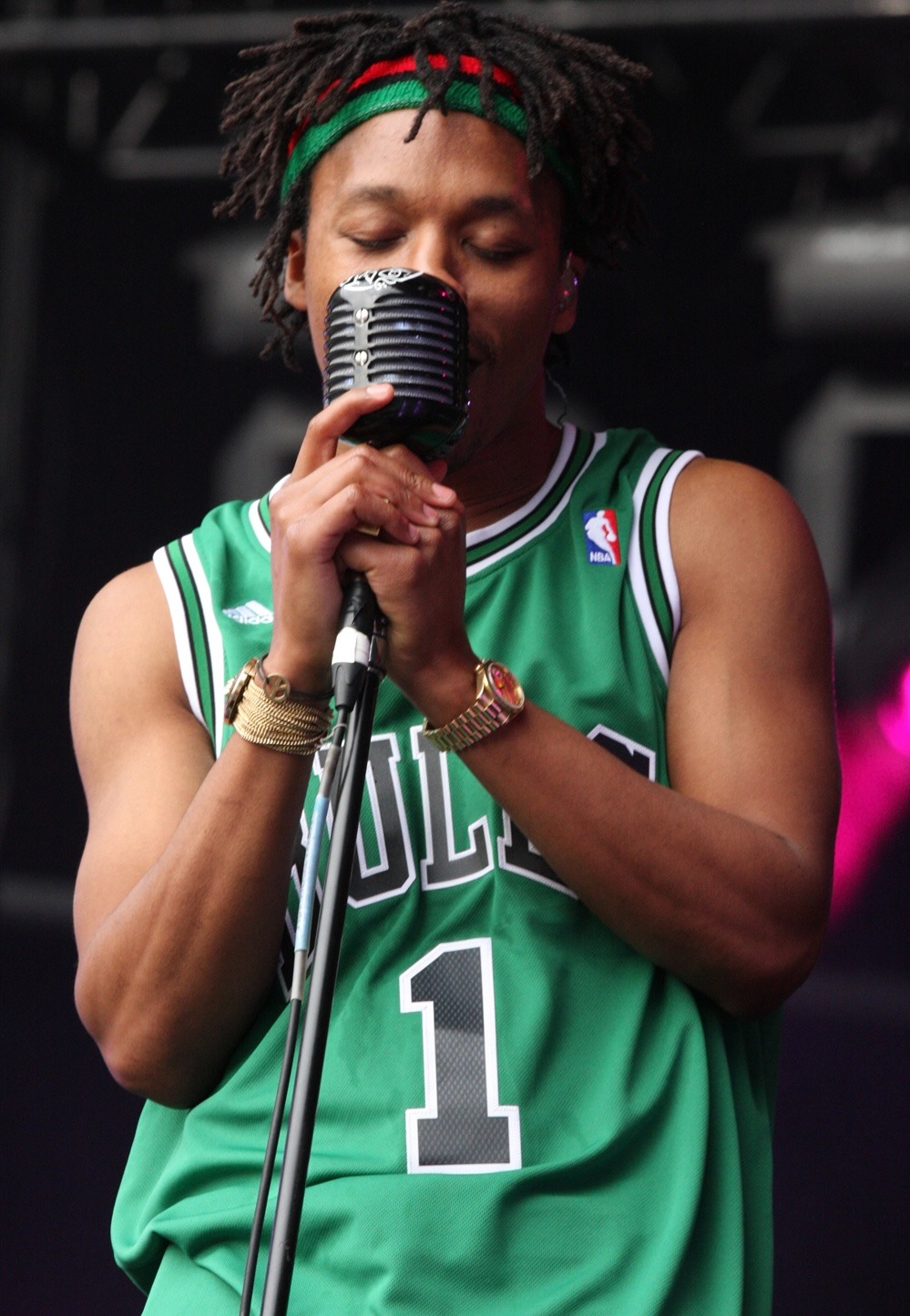 Lupe Fiasco performing on stage