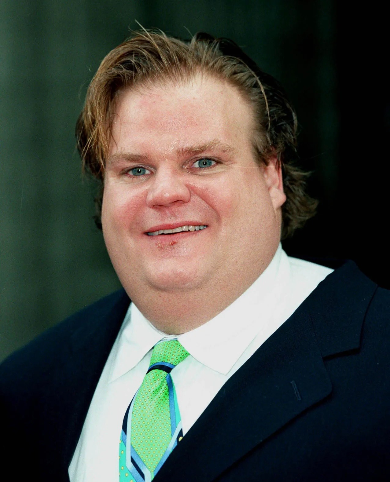 Chris Farley in a comedic pose