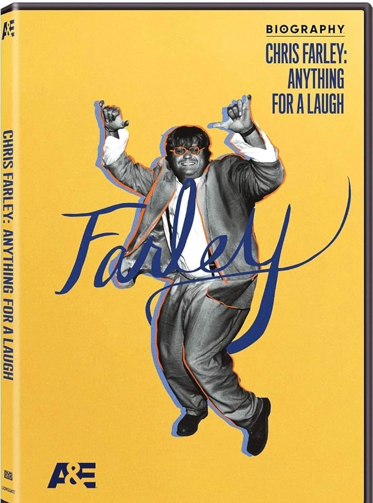 Chris Farley in a suit